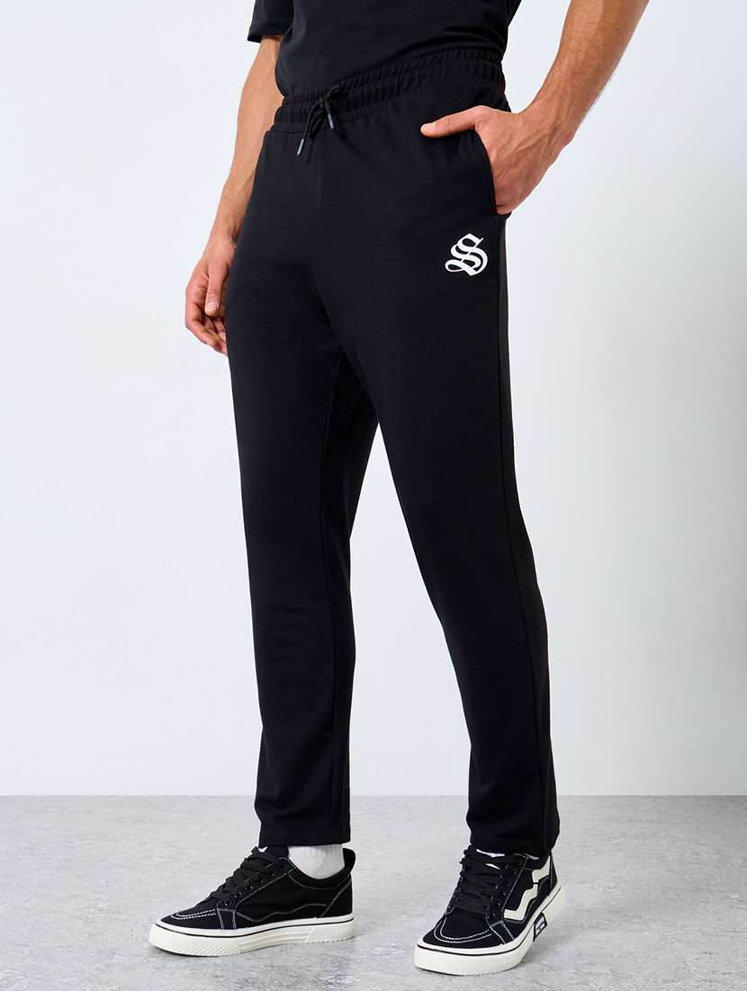 men solid mid rise full length track pant - 22174778 -  Zoom Image - 0