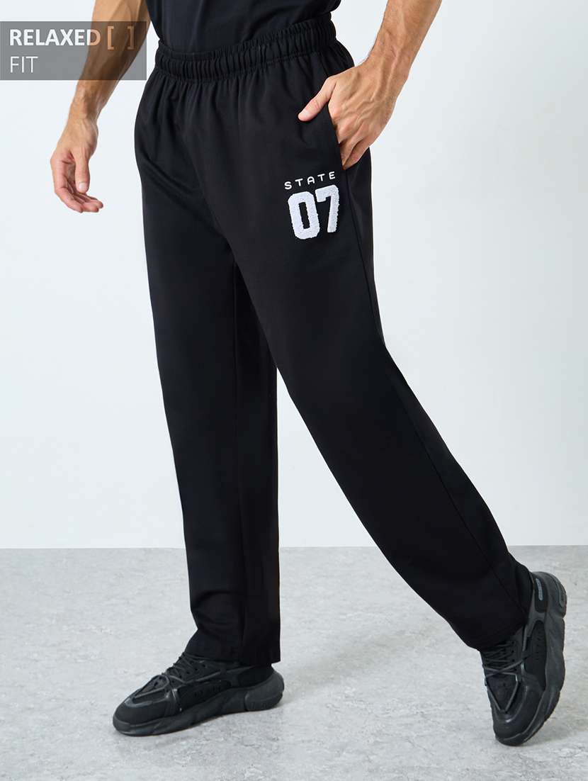 men solid mid rise full length track pant