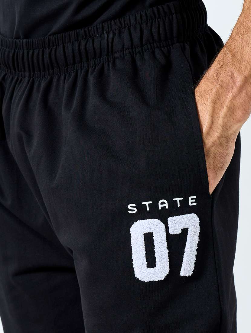 men solid mid rise full length track pant - 22174786 -  Standard Image - 3