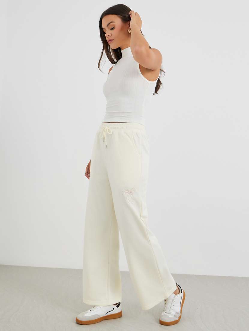 women solid mid rise track pant - 22176730 -  Standard Image - 3