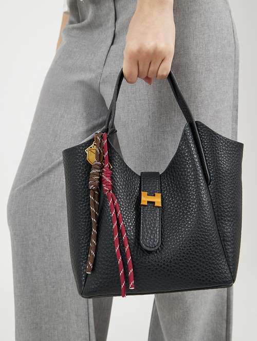 women black solid handbag - 22176754 -  Standard Image - 0