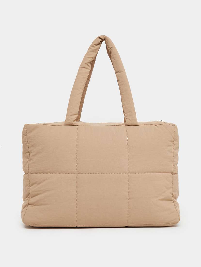 women beige solid quilted tote abg