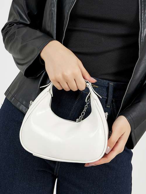 women white solid handbag - 22176765 -  Standard Image - 0
