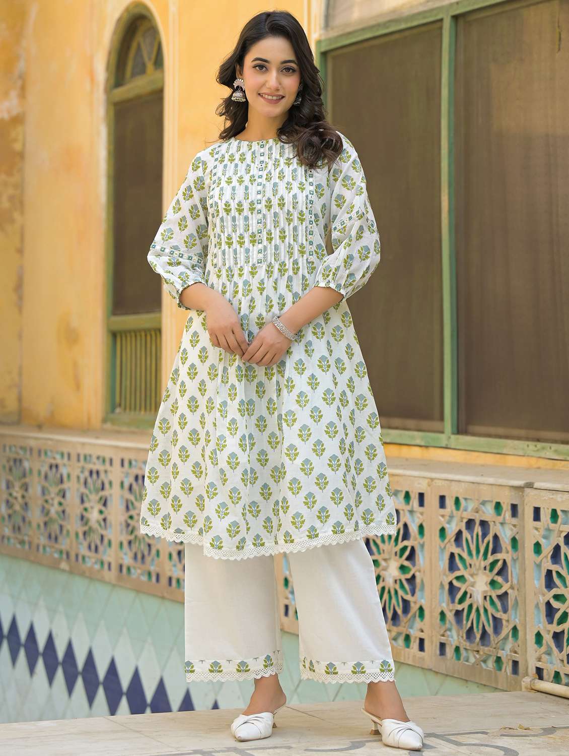 women floral printed three quarter sleeve kurta palazzo set