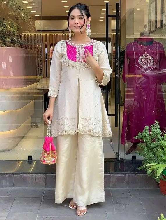 women embroidered kurta and palazzo set