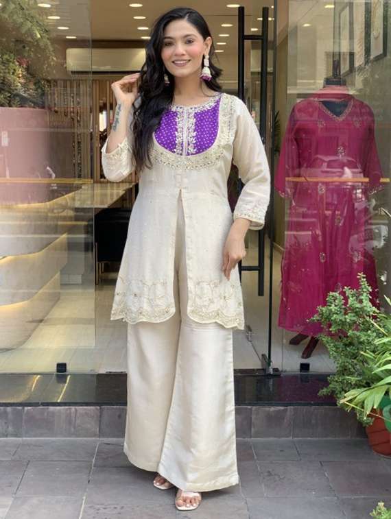 women embroidered kurta and palazzo set