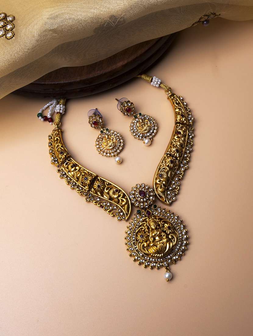 women gold plated stone studded necklace set