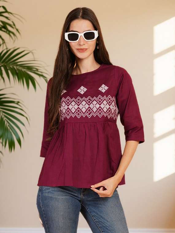 women embroidered three quarter sleeve flared top