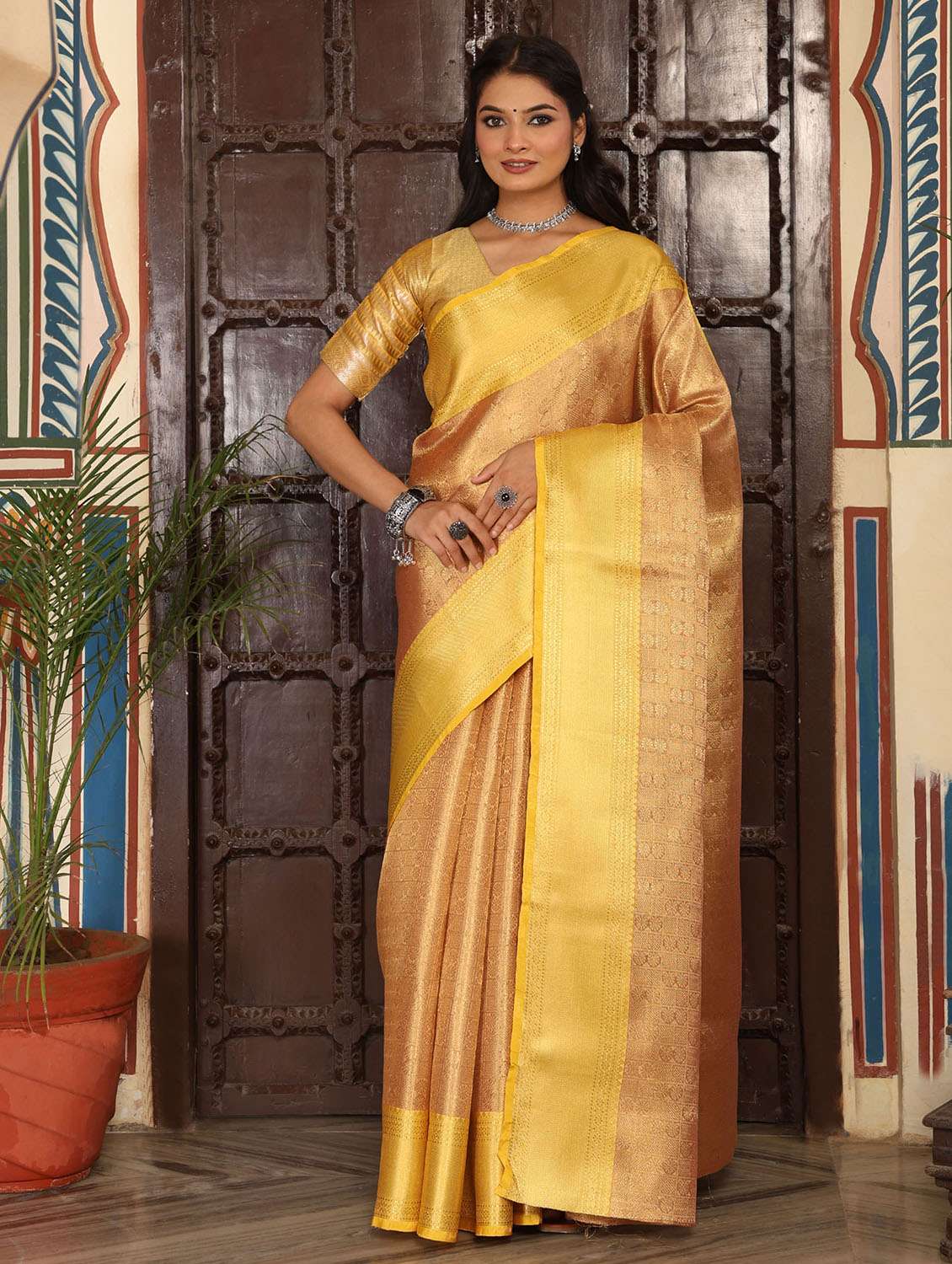 women self design banarasi saree with blouse