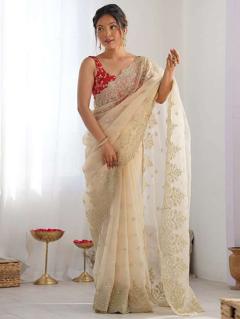 women solid with work embellished saree with blouse