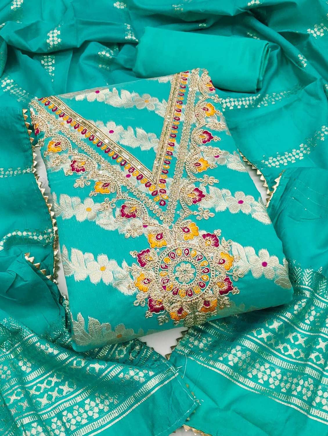 women self design embroidered unstitched suit set