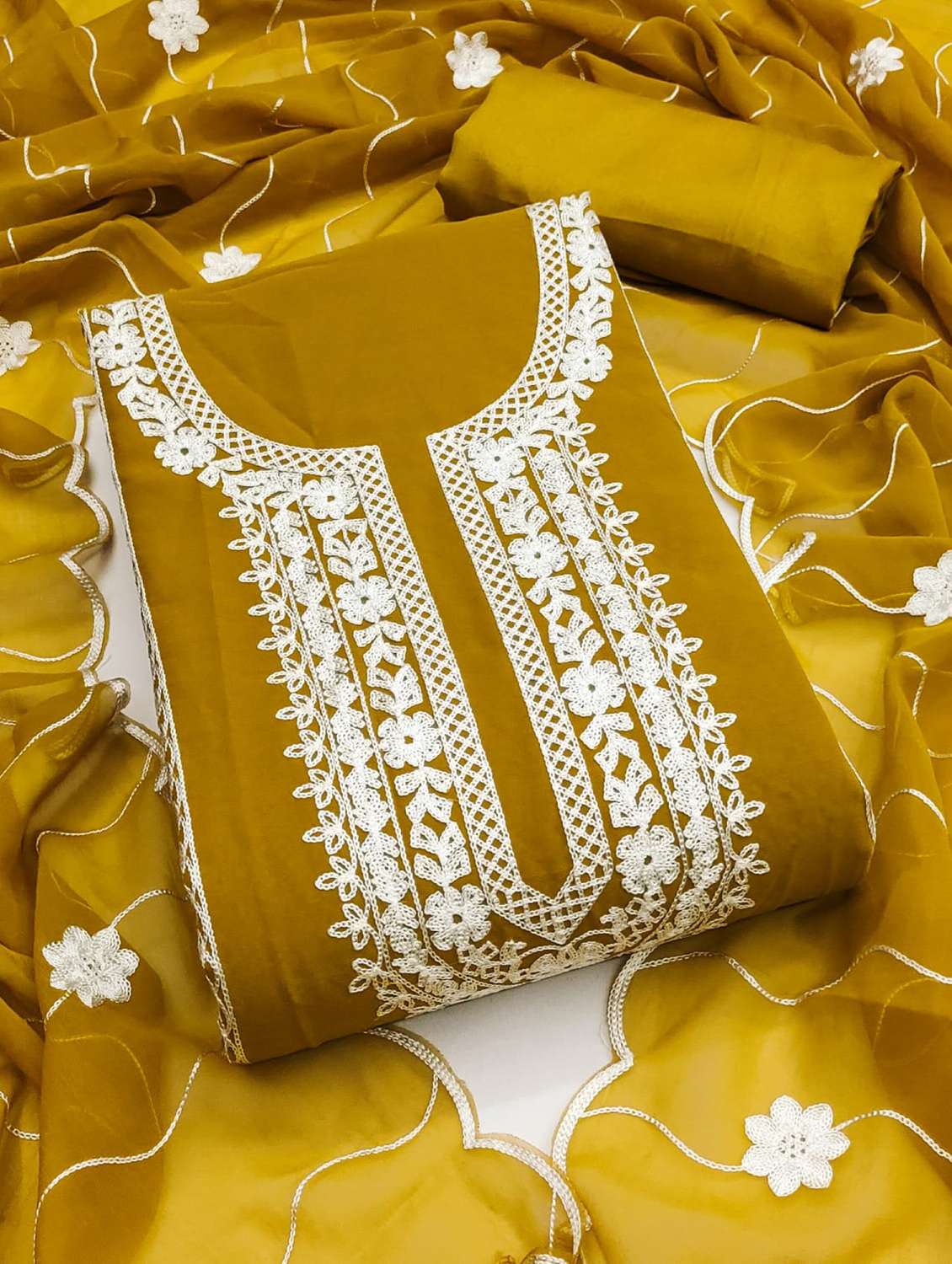 women solid with work embroidered unstitched suit set