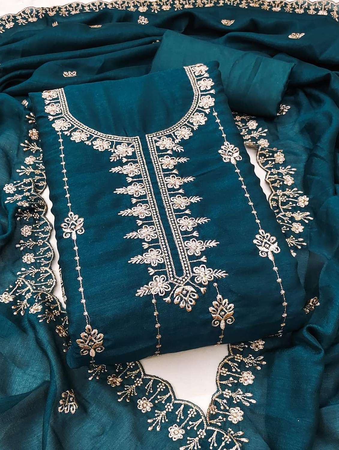 women solid with work embroidered unstitched suit set