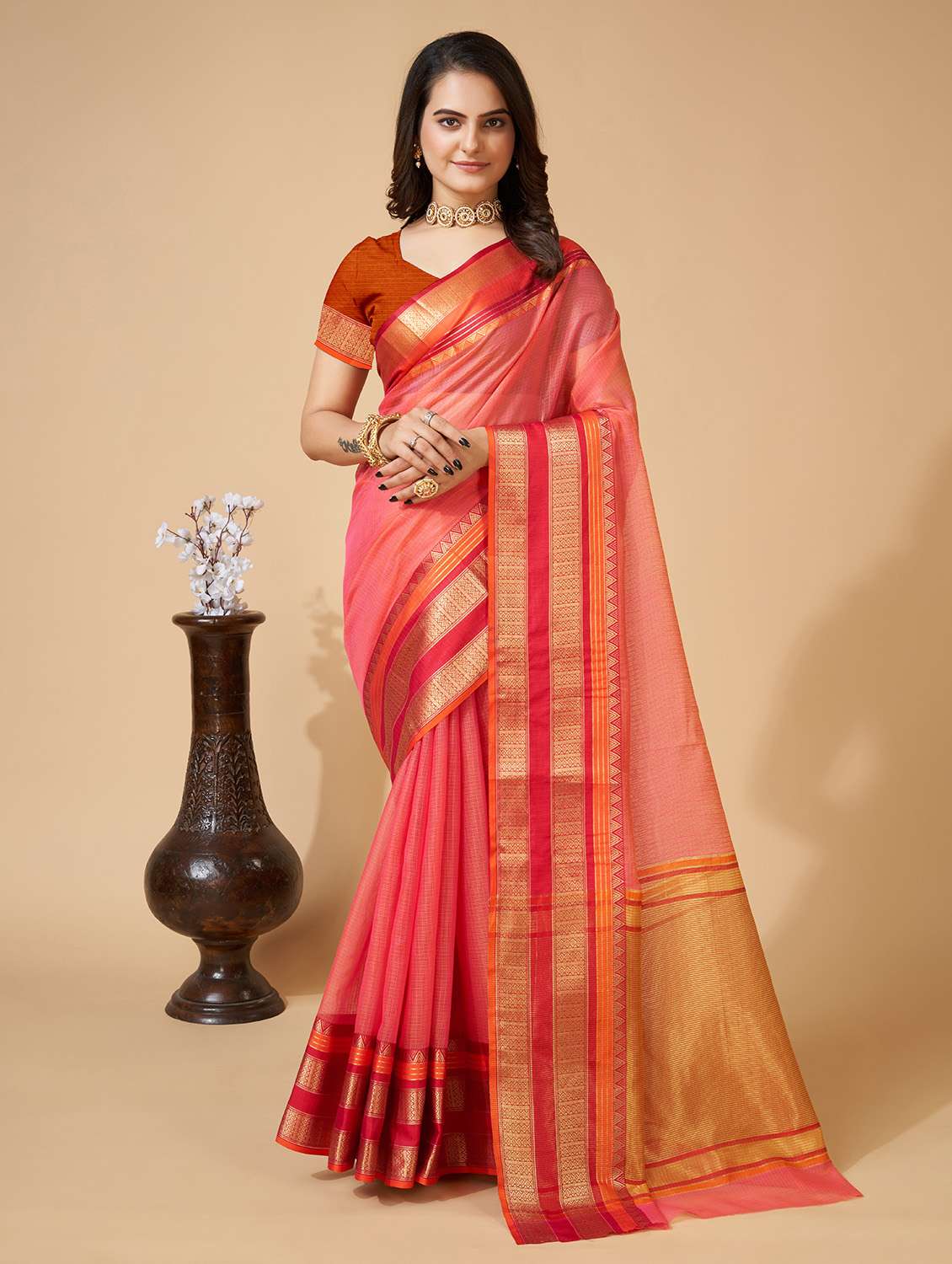 women solid with bordered saree with blouse