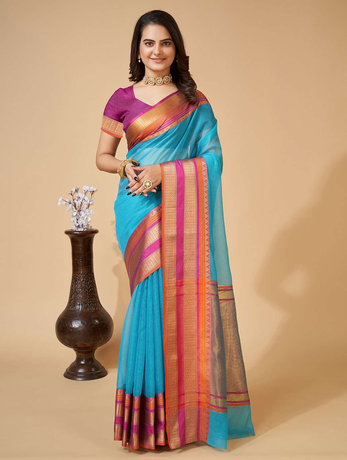 women solid with bordered saree with blouse