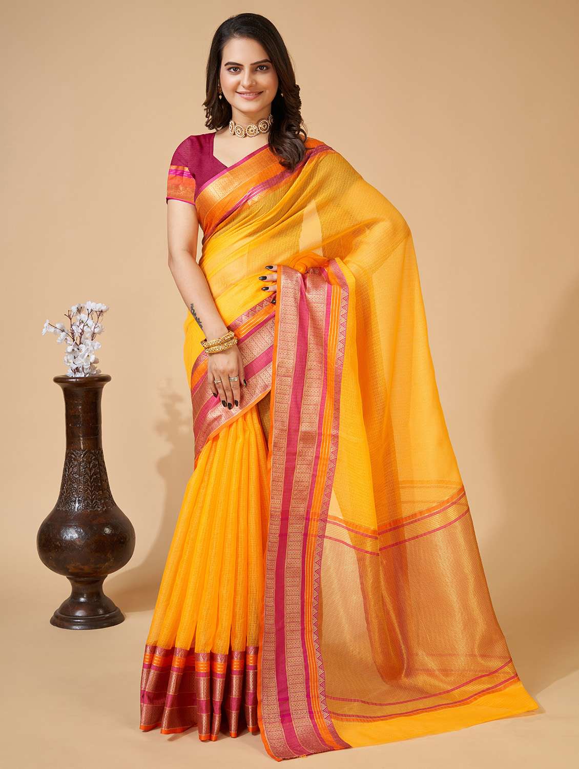 women solid with bordered saree with blouse