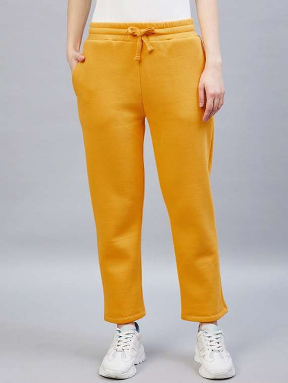 women solid mid rise track pant