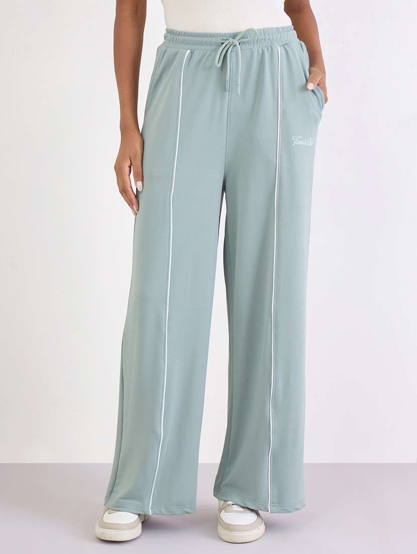 women solid high rise relaxed fit track pant