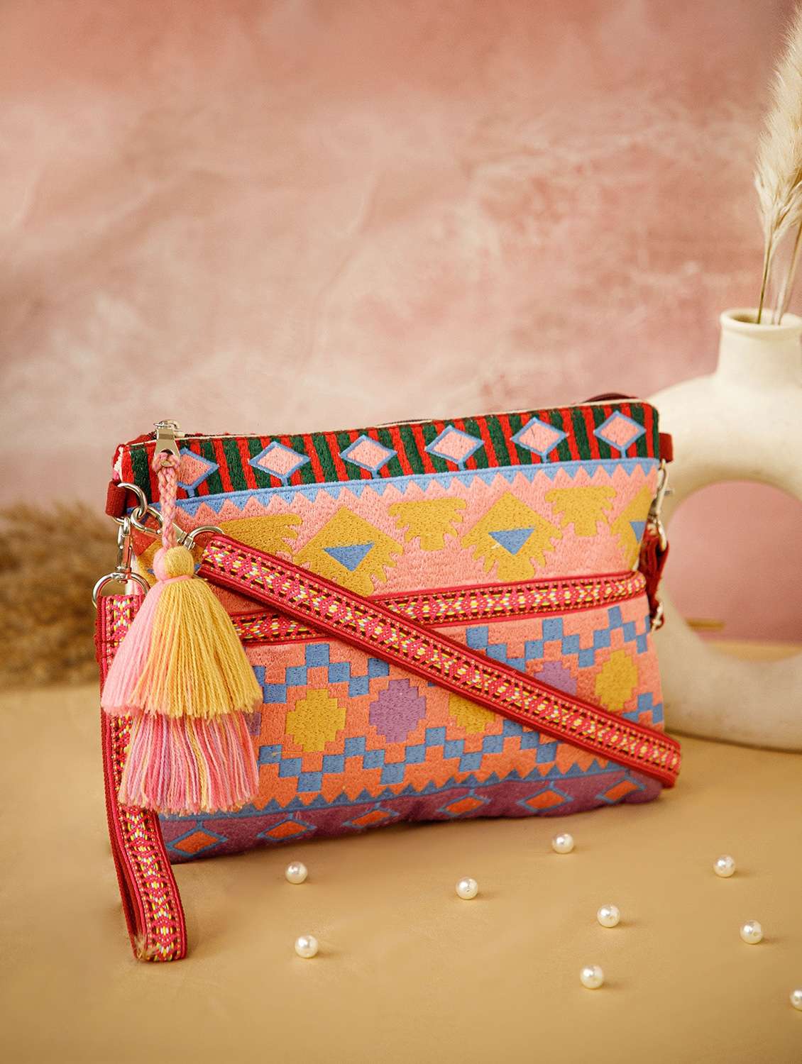 women embroidered sling bag with tassels