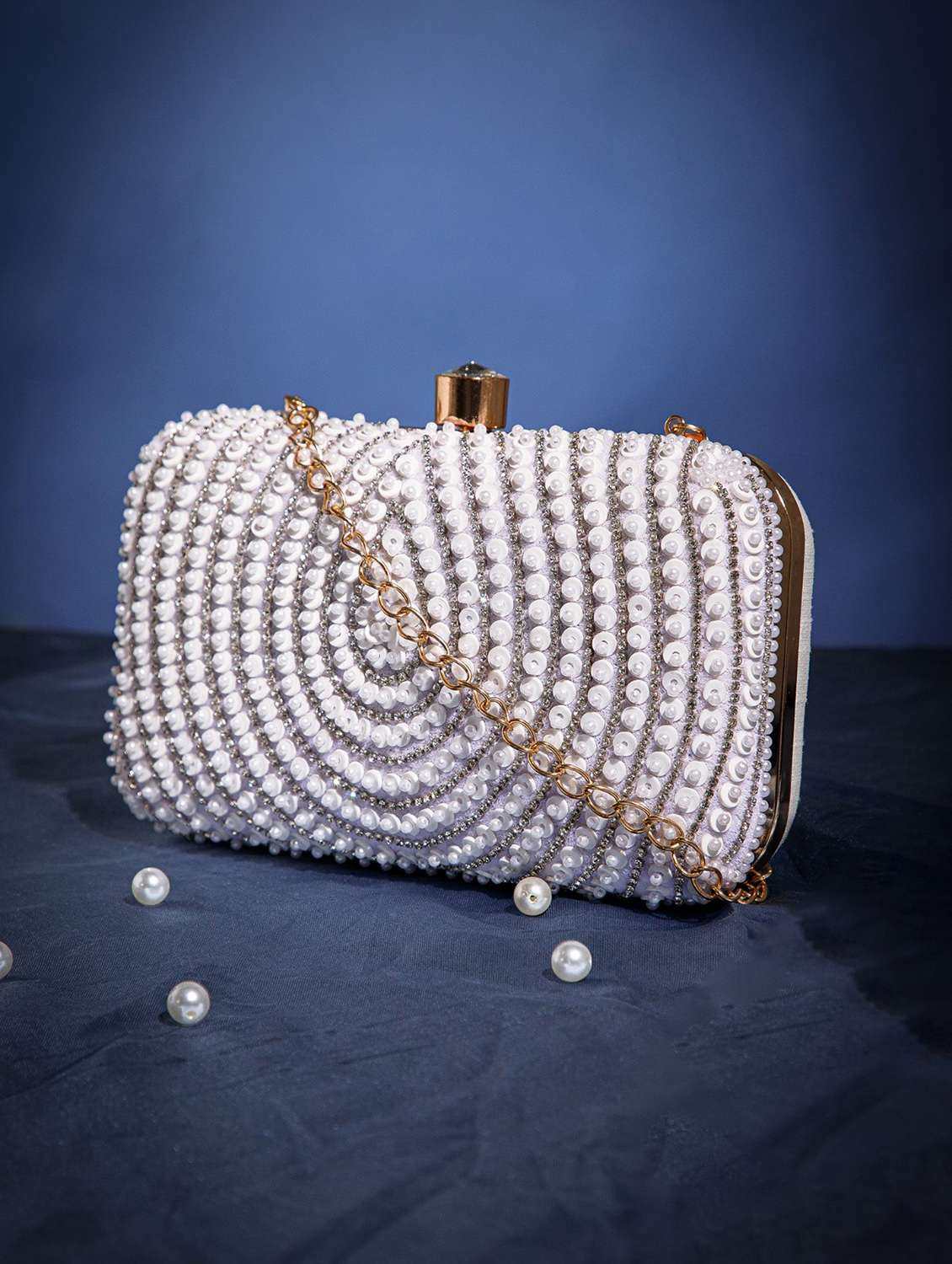 women embellished white clutch with detachable strap