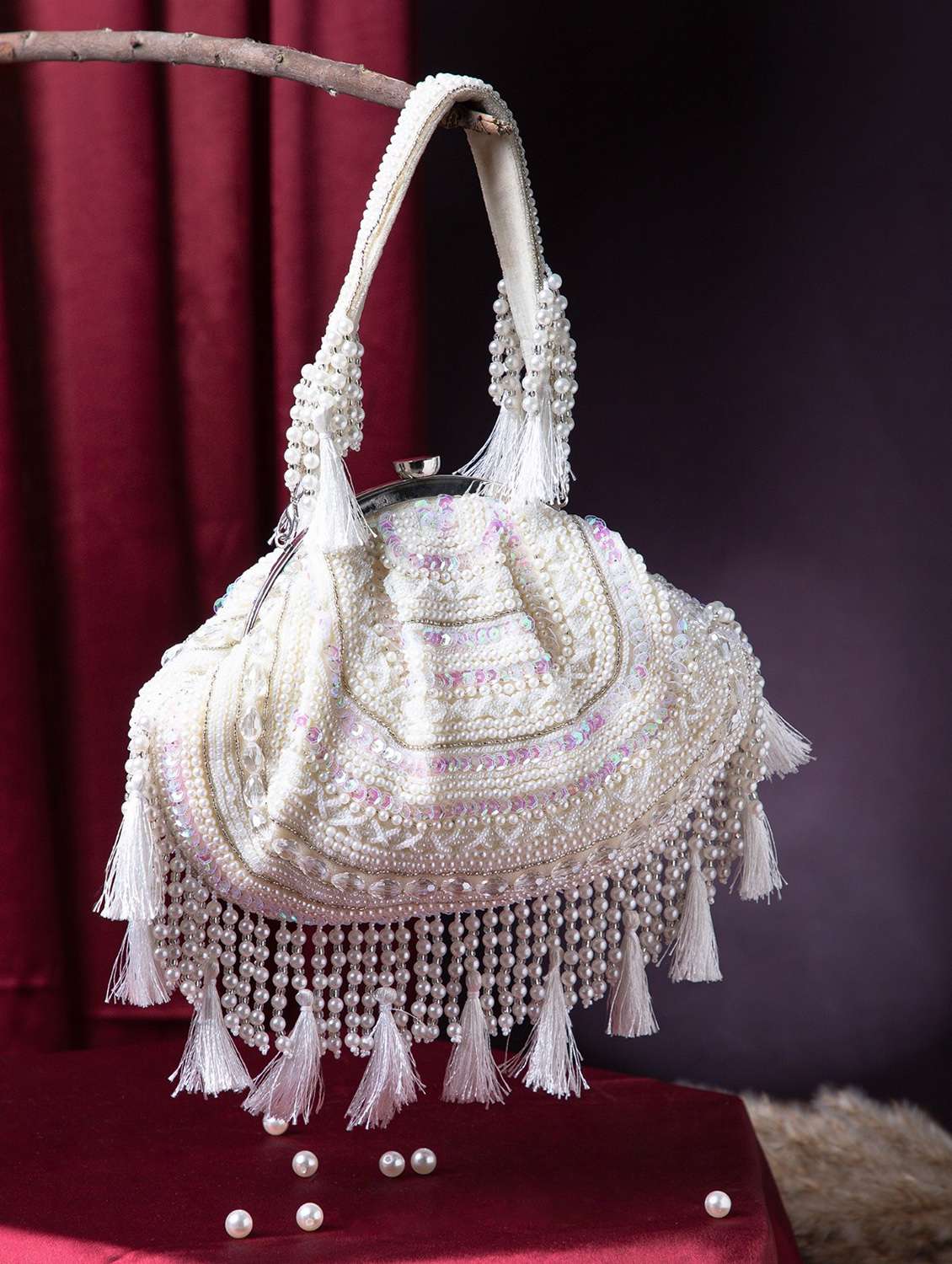women embellished cream velvet clutch with tassels - 22220135 -  Zoom Image - 0