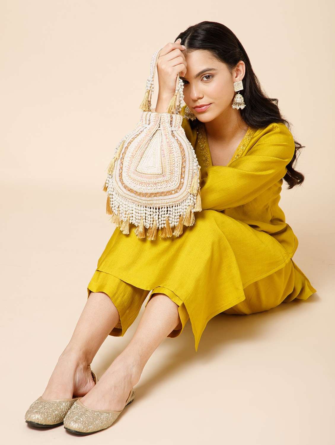 embroidered velvet ethnic potli with tassels - 22220145 -  Standard Image - 5