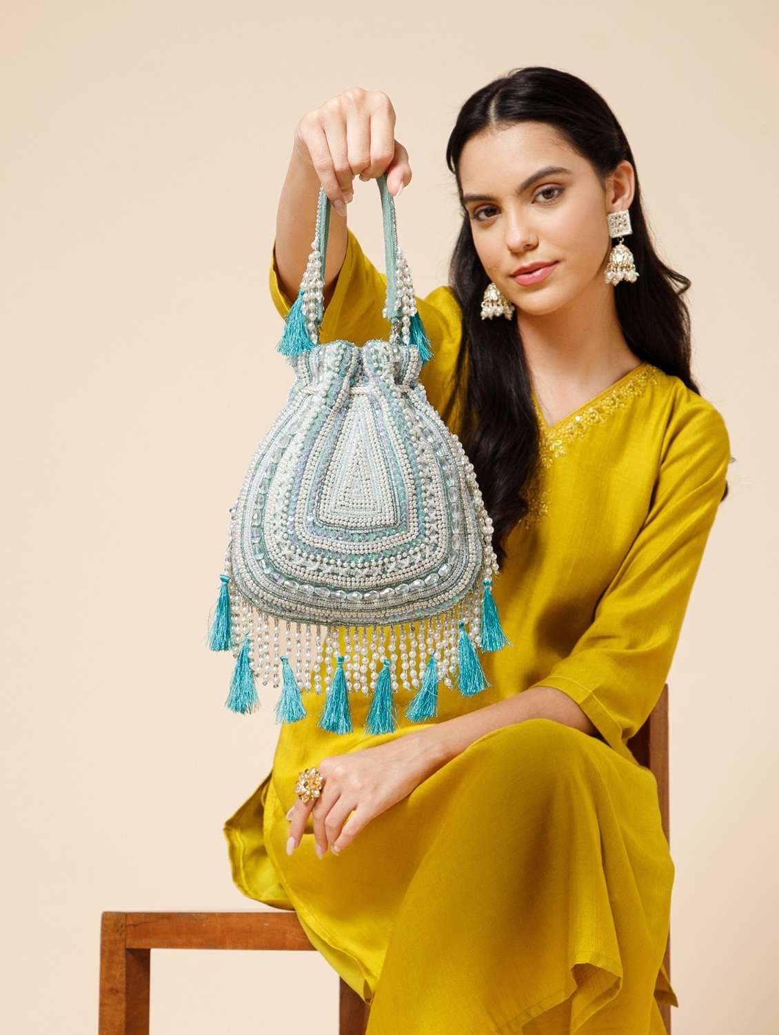 ethnic embroidered velvet potli with tassels  - 22220147 -  Standard Image - 5