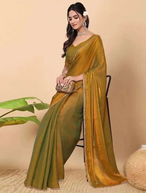 women solid with embellished bordered saree with blouse