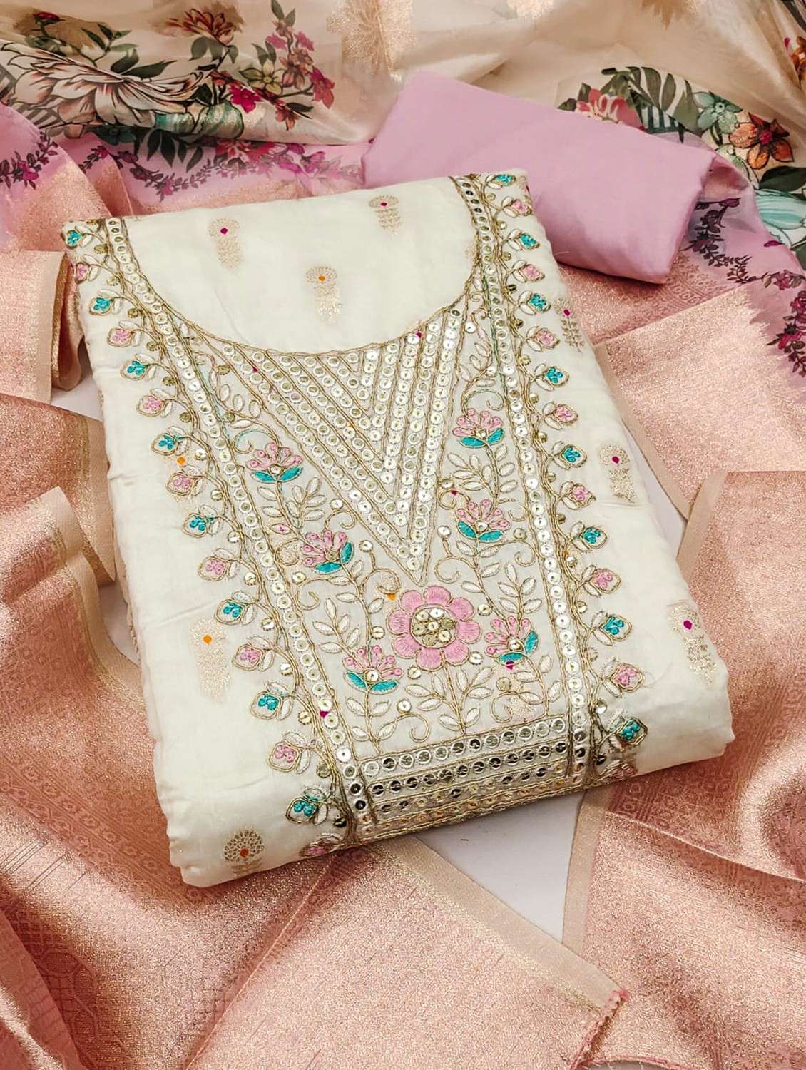 women self design embroidered unstitched suit set