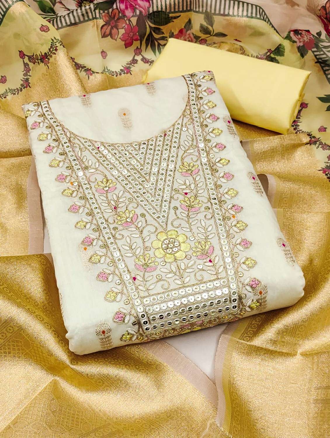 women self design embroidered unstitched suit set