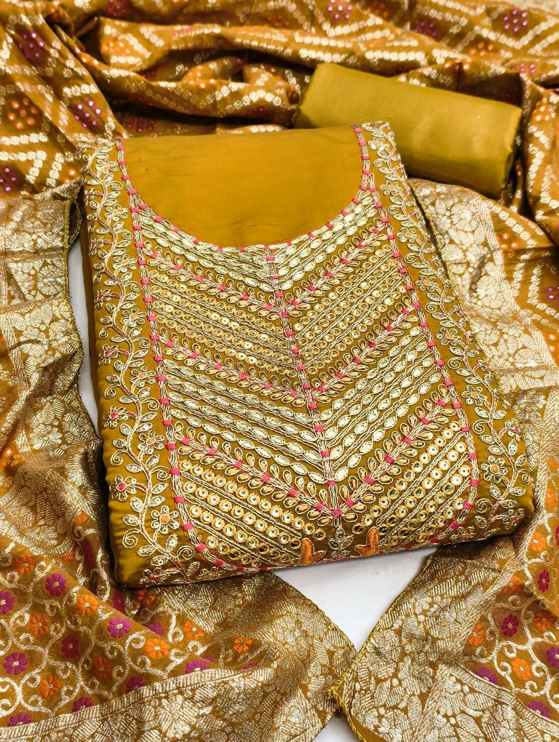 women solid with work unstitched suit set