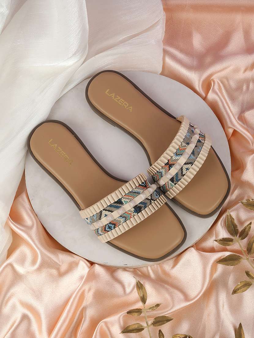 women slip on flat sandal