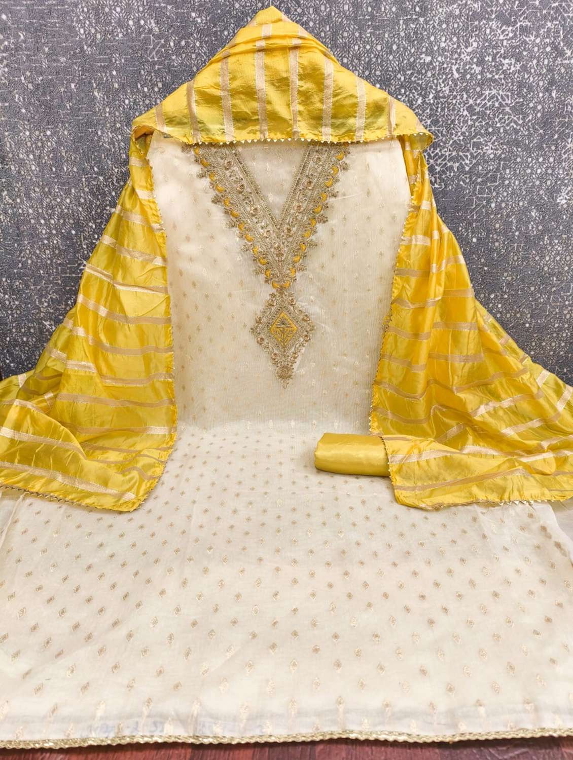 women self design embroidered unstitched suit set