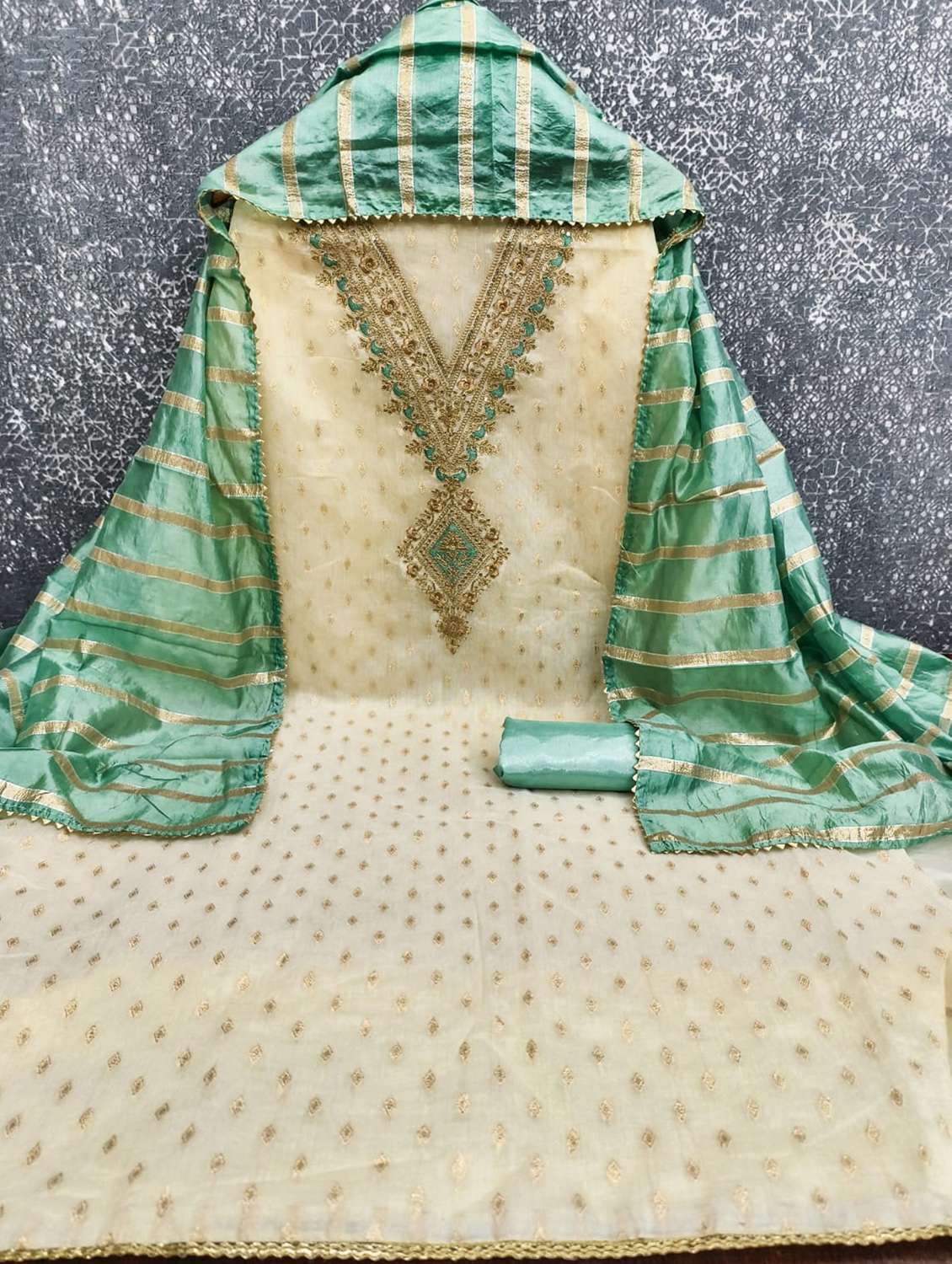 women self design embroidered unstitched suit set