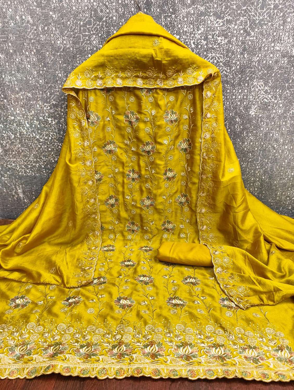 women solid with work embroidered unstitched suit set