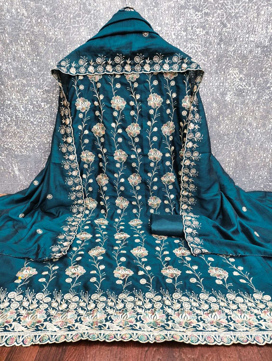 women solid with work embroidered unstitched suit set