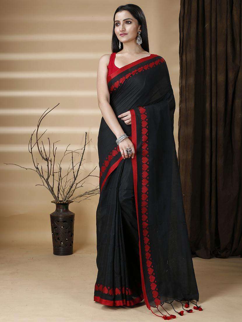women solid with bordered handloom saree