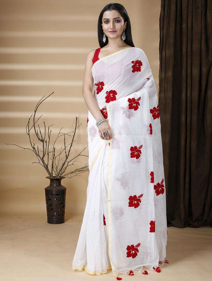 women solid with work embroidered saree