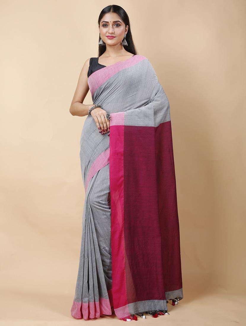 women solid with bordered handloom saree