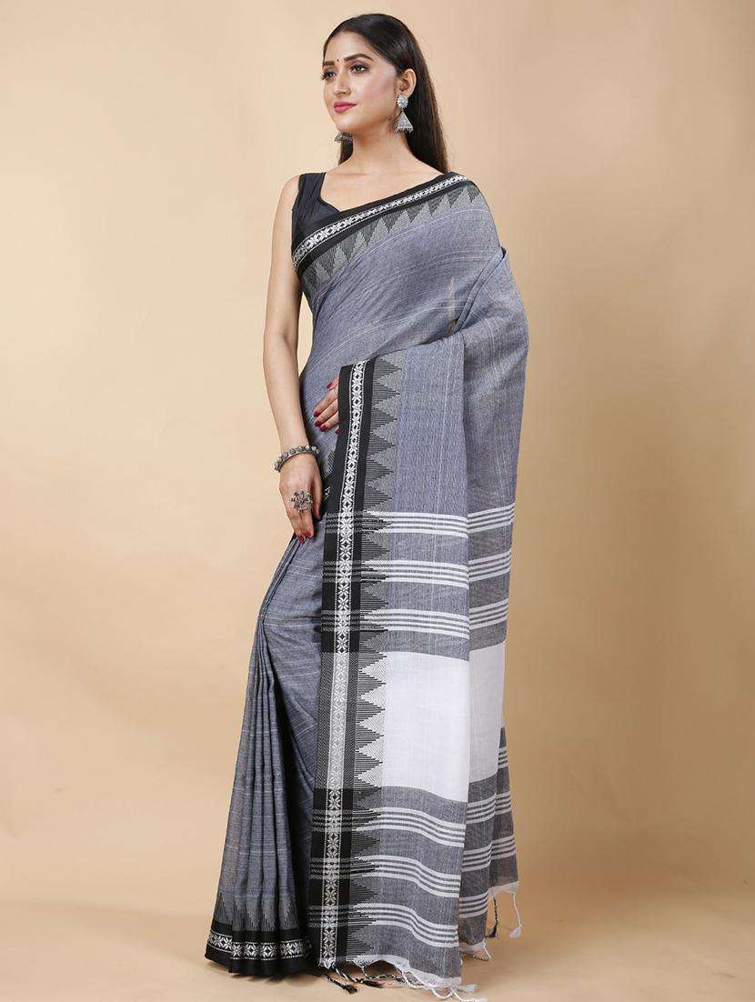 women solid with bordered handloom saree