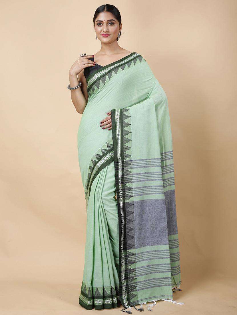 women solid with bordered handloom saree