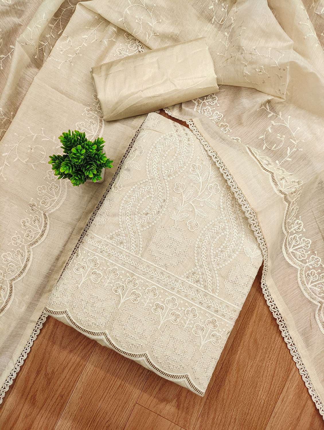 women solid with work embroidered unstitched suit set