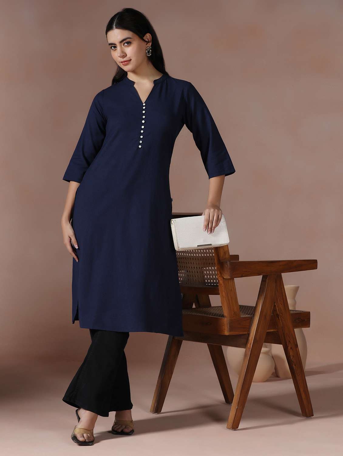 women solid three quarter sleeve straight kurta 