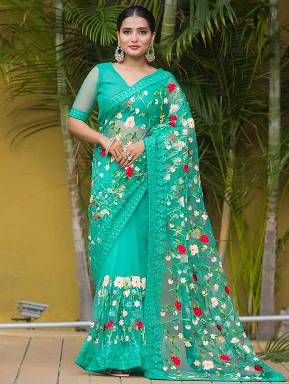 women solid with work embroidered saree with blouse