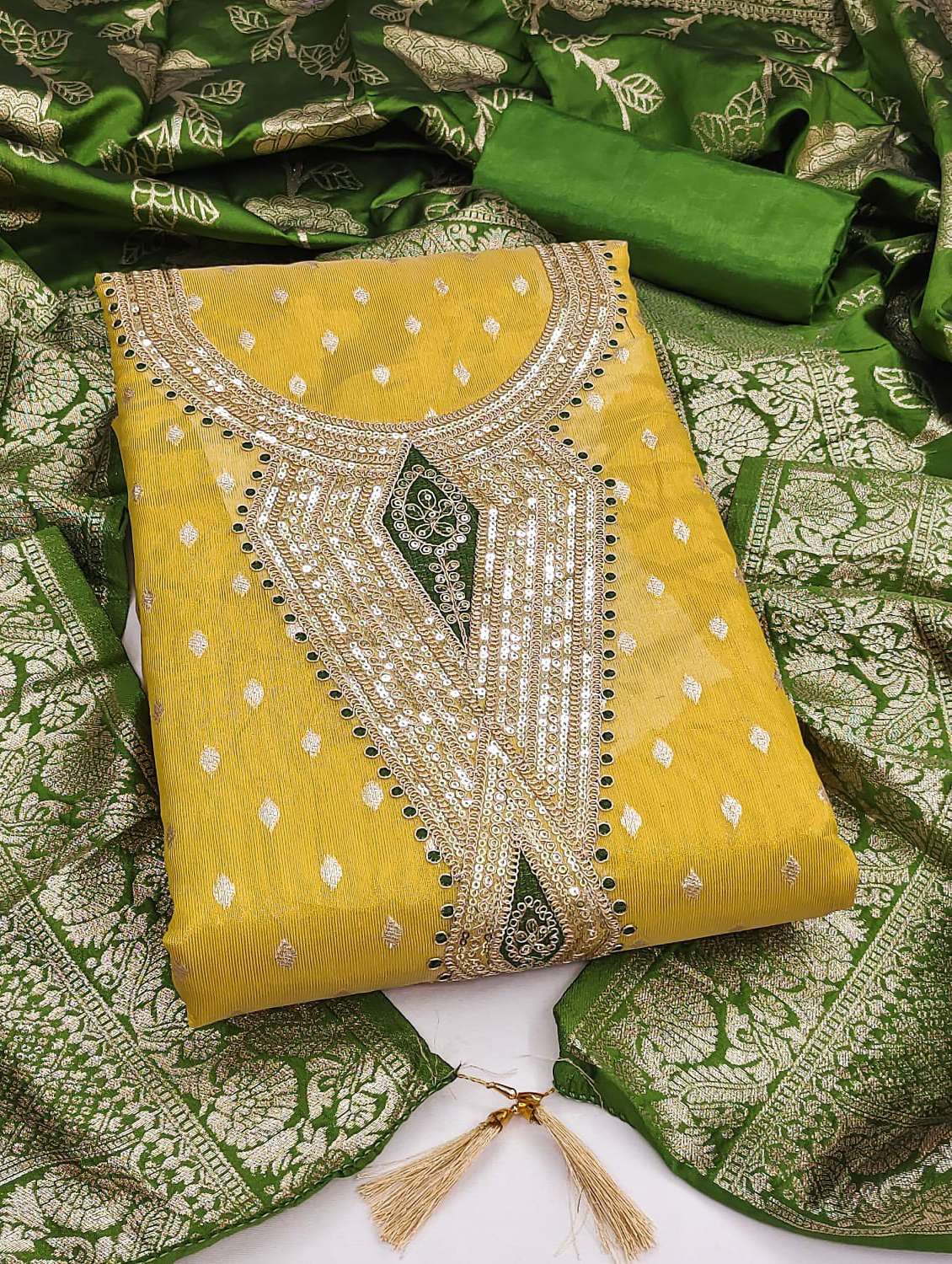 women self design embroidered unstitched suit set