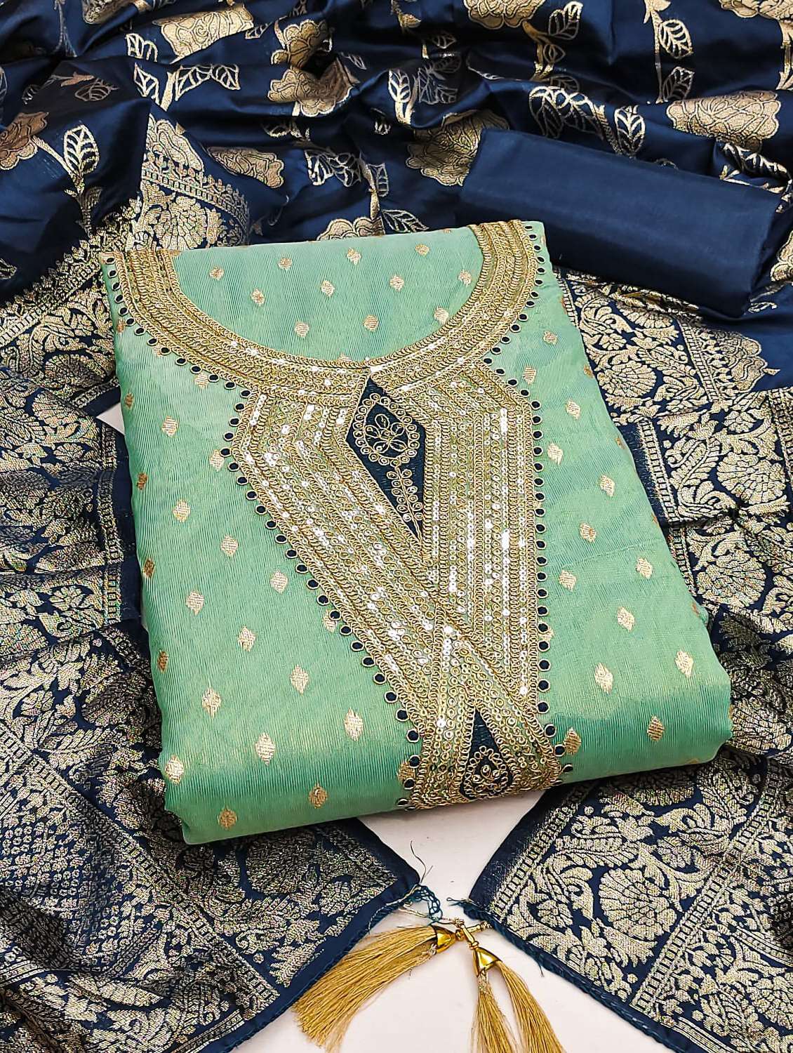 women self design embroidered unstitched suit set