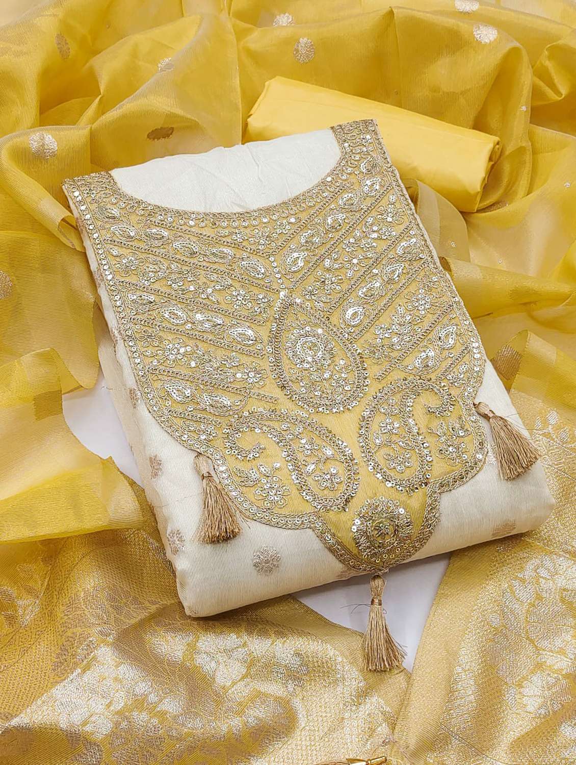 women self design embroidered unstitched suit set