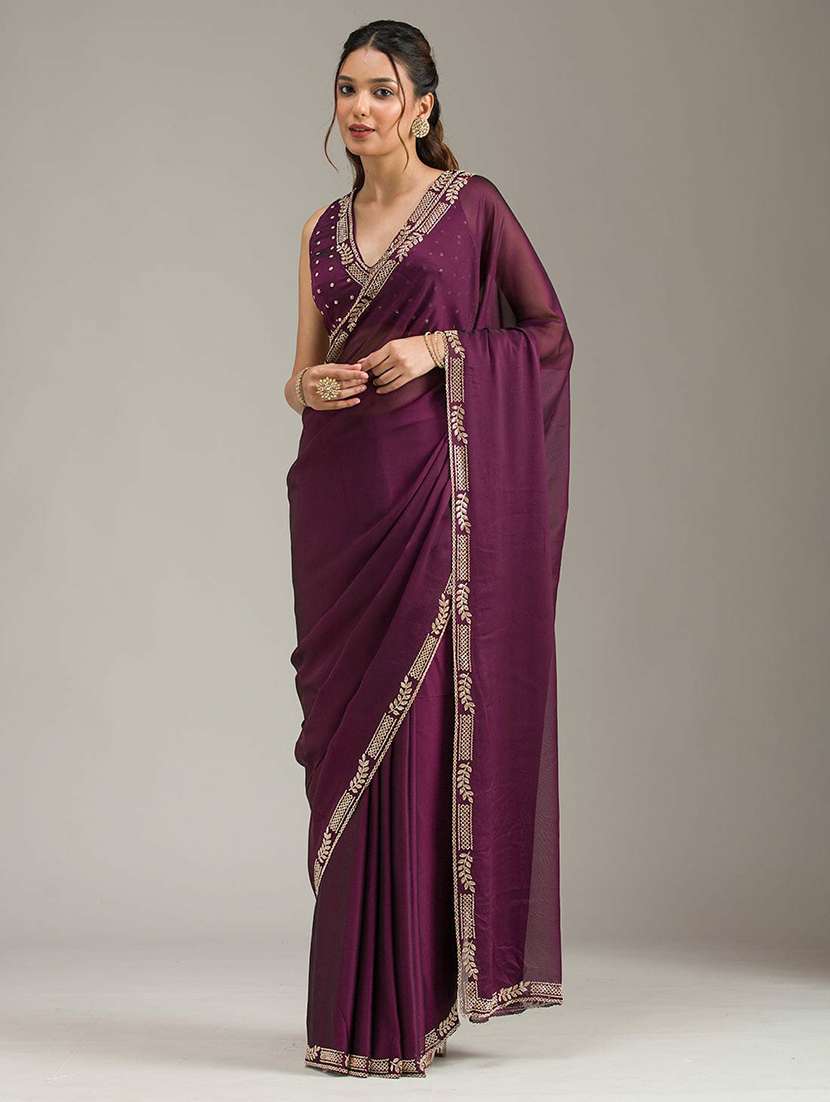 women solid with embellished bordered saree with blouse