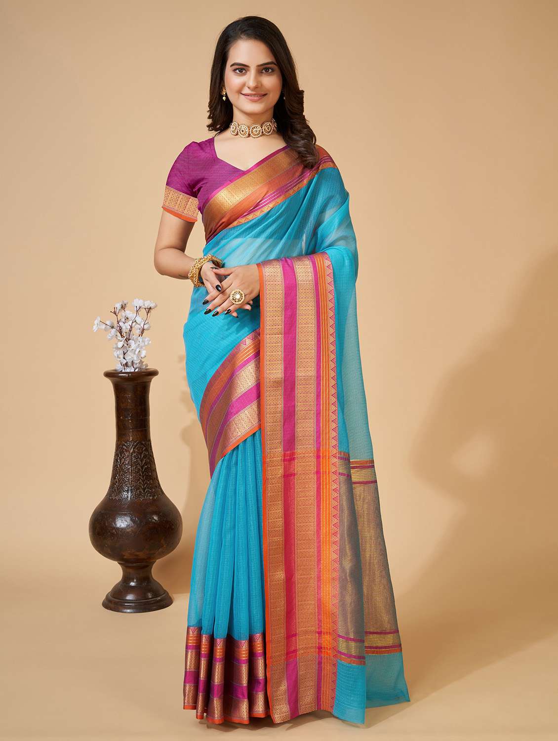 women solid with bordered saree with blouse