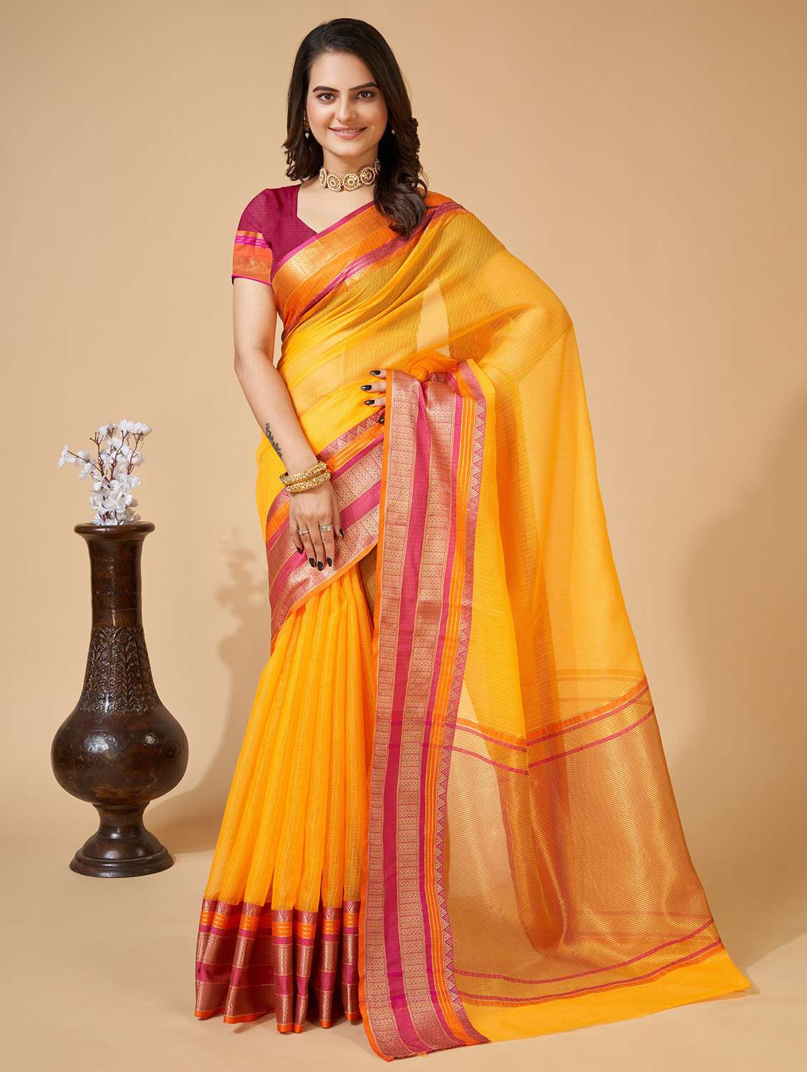 women solid with bordered saree with blouse
